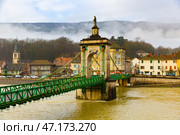 Landscape French commune of Seyssel with the flowing Rhone River and a bridge. Стоковое фото, фотограф Яков Филимонов / Фотобанк Лори