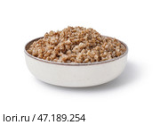 Тарелка вкусной гречневой каши на белом фоне. Стоковое фото, фотограф Pixel_shot / Фотобанк Лори
