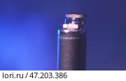 The rotation of a metal flask for alcohol. Стоковое видео, видеограф Потийко Сергей / Фотобанк Лори