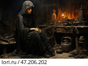 A mysterious figure sitting in a dark room reminiscent of an alchemist's lab or a witch's den. The man, wrapped in a black hooded robe, has a gloomy and brooding look. His face is illuminated by a faint orange light from candles and a fire burning on a table littered with old bottles, roots, skulls and strange artifacts. An atmosphere of desolation, mystery and mysticism reigns around. The scene is reminiscent of old legends about witches, alchemists and magical rituals. Стоковое AI-изображение, AI-художник Анна Кривицкая / Фотобанк Лори