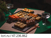 Сет суши и роллов на столе. Стоковое фото, фотограф Светлана Денисова / Фотобанк Лори