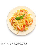 Тарелка вкусной пасты с креветками на белом фоне. Стоковое фото, фотограф Pixel_shot / Фотобанк Лори