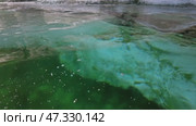 Ice cave on Baikal lake in winter. Стоковое видео, видеограф Михаил Коханчиков / Фотобанк Лори