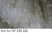 Ice cave on Baikal lake in winter. Стоковое видео, видеограф Михаил Коханчиков / Фотобанк Лори