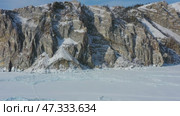 Rocky shore of Olkhon Island on Baikal. Стоковое видео, видеограф Михаил Коханчиков / Фотобанк Лори