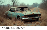 A classic car, weathered and rusty, sits idly on a grassy roadside surrounded by sparse trees and overgrown vegetation, illustrating its long abandonment. Стоковое AI-изображение, AI-художник Sergey Grishin / Фотобанк Лори