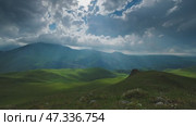Mountain landscape with sun rays. Стоковое видео, видеограф Михаил Коханчиков / Фотобанк Лори