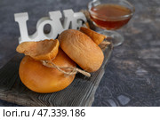 Collection of cheeses, rennet cheese smoked suluguni made from cow's milk in the Caucasus in Dagestan and Ossetia, yellow smoked cheese. Стоковое фото, фотограф Оксана Медведева / Фотобанк Лори