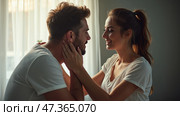 A couple shares a loving gaze as they hold each other close, enveloped in a warm atmosphere created by gentle lighting. The connection is heartfelt and genuine. Стоковое AI-изображение, AI-художник Sergey Grishin / Фотобанк Лори