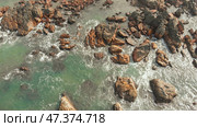 Aerial view rocks and stones on the Arambol beach in North Goa, India. Стоковое фото, фотограф Mikhail Davidovich / Фотобанк Лори
