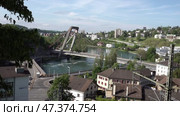 Вид на реку Рейн и мост в городе Шаффхаузен. Швейцария. Май. View of the Rhine River and the bridge in the city Schaffhausen. Switzerland. May. Стоковое видео, видеограф Горшков Александр / Фотобанк Лори