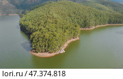 Aerial view beautiful nature with mountains and hills by Lake Mattupetty. Kerala State. Near the city of Munar. Стоковое фото, фотограф Mikhail Davidovich / Фотобанк Лори