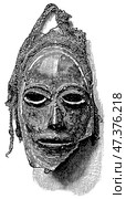 Skull mask (lor) from New Pomerania. Artifact of Oceania and Australia. Publication of the "Meyers encyclopedia", Vol. 7, Leipzig, Germany, 1910. Стоковое фото, фотограф Sergey Kohl / Фотобанк Лори