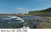 The Magang tidal zone in Taiwan. This is one of the littoral zones of the country with a rich coastline ecology and the largest number of green algae. Стоковое видео, видеограф  Сергей Фомин / Фотобанк Лори