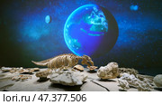 Doha, Qatar - Jan 06 2024, a panoramic view of paleotological finds, skeleton and fossils, an image of Earth and stars is projected on background, an exhibit of National Museum of Qatar, Doha, Qatar. Редакционное фото, фотограф Сергей Богомяко / Фотобанк Лори