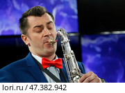 Belarus, Gomel, the performance of the Gomel city orchestra. March 29, 2017.Playing the saxophone.Profession musician. Saxophonist. Performing Jazz. Редакционное фото, фотограф Лазаренко Светлана / Фотобанк Лори