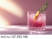 Refreshingly Colorful Cocktail Served in a Crystal Glass With Floral Accents in Soft Afternoon Light. Стоковое AI-изображение, AI-художник Юлия Гапеенко / Фотобанк Лори