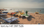 Calella, Spain - August 9, 2018: People at beach in Calella city. Spain. Стоковое видео, видеограф Mikhail Davidovich / Фотобанк Лори