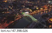 Bridge of Peace at night in Tbilisi. Стоковое видео, видеограф Михаил Коханчиков / Фотобанк Лори