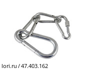 Альпинистские карабины на белом фоне. Climber carabiners on a white background. Стоковое фото, фотограф Татьяна Д / Фотобанк Лори