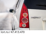 KRASNOYARSK, RUSSIA - February 2, 2025: White Mazda Premacy. Редакционное фото, фотограф Плотников Дмитрий / Фотобанк Лори