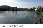 Река Рейн в городе Шаффхаузен. Швейцария. Май. The Rhine River in the city of Schaffhausen. Switzerland. May. Стоковое видео, видеограф Горшков Александр / Фотобанк Лори
