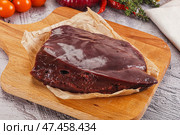 Raw beef liver for cooking. Стоковое фото, фотограф Андрей Старостин / Фотобанк Лори