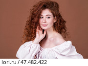 Studio portrait of a red-haired girl. Стоковое фото, фотограф Андрей Аркуша / Фотобанк Лори