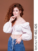 Studio portrait of a red-haired girl. Стоковое фото, фотограф Андрей Аркуша / Фотобанк Лори