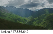 Mountain landscape with sun rays. Стоковое видео, видеограф Михаил Коханчиков / Фотобанк Лори