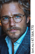 Curly-haired man with striking blue eyes and stylish glasses showcases a sophisticated look in an upscale setting illuminated by evening lights. Стоковое AI-видео, аниматор Данила Большаков / Фотобанк Лори