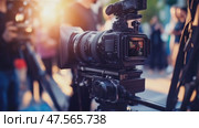 Professional cinema camera recording live event at sunset. Стоковое AI-видео, аниматор Юрий Поздников / Фотобанк Лори