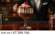 Chocolate dessert topped with whipped cream and cherry served in elegant glass. Шоколадный десерт со взбитыми сливками и вишней подается в элегантном бокале. Стоковое AI-изображение, AI-художник Katsiaryna Repich / Фотобанк Лори