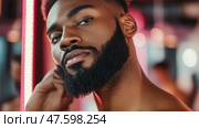 Stylish male posing with confident expression in modern barbershop setting during daylight. Стоковое AI-изображение, AI-художник Сергей Толмачёв / Фотобанк Лори