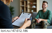 Engaged discussion in a counseling session. Стоковое AI-изображение, AI-художник Андрей Бакусов / Фотобанк Лори