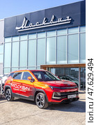 Москвич 3 новый автомобиль рядом с официальным дилерским центром. Редакционное фото, фотограф FotograFF / Фотобанк Лори