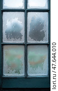 Winter Windowpane: A Frozen Fantasy on Glass - a Study in Frost's Intricate Art, Cold Beauty and the Ephemeral Nature. Стоковое AI-изображение, AI-художник Данила Большаков / Фотобанк Лори