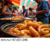 A Street Vendor Prepares Fresh Churros, as Golden Spirals Sizzle in Hot Oil. Стоковое AI-изображение, AI-художник Sergey Grishin / Фотобанк Лори