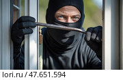 Candid burglary attempt closeup. Стоковое AI-изображение, AI-художник Андрей Бакусов / Фотобанк Лори