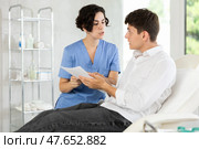 male patient documents signing. Стоковое фото, фотограф Яков Филимонов / Фотобанк Лори