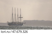 15 April 2025 - Lisbon, Portugal - Four masted sailing ship navigating coastal waters. Редакционное видео, видеограф Константин Шишкин / Фотобанк Лори