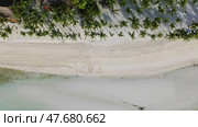 Aerial top view of beautiful tropical sandy beach. Стоковое фото, фотограф Михаил Коханчиков / Фотобанк Лори