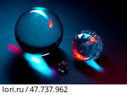 Close-Up of Glass Spheres in Vibrant Colorful Lighting. Стоковое фото, фотограф Мара Фрибус / Фотобанк Лори