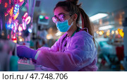 Healthcare Hero: Frontline Worker Entering Data in Neonatal ICU during Pandemic Era. Стоковое AI-изображение, AI-художник Данила Большаков / Фотобанк Лори
