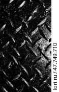 Элегантная индустриальная эстетика: блестящая черная металлическая ромбовидная текстура для современного дизайна. Стоковое AI-изображение, AI-художник ФотоИнтеллект / Фотобанк Лори