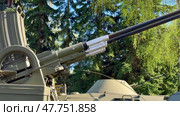 The Dual Barrel Artillery is displayed dramatically against a lush green landscape. Стоковое видео, видеограф Vladimir Vintonjak / Фотобанк Лори