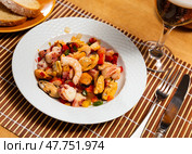 Popular Spanish appetizer, seafood salpicon, is served on plate. Стоковое фото, фотограф Яков Филимонов / Фотобанк Лори