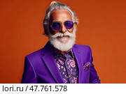 Carefree extravagant elderly man in purple sunglasses and suit on orange background. Стоковое AI-изображение, AI-художник Данила Большаков / Фотобанк Лори