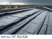View of house under construction with red roof on waterproofing layer, created with Generative AI. Стоковое AI-изображение, AI-художник Данила Большаков / Фотобанк Лори