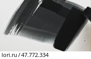 Abstract black strokes creating texture on white canvas. Стоковое AI-видео, аниматор KATERINA AI / Фотобанк Лори